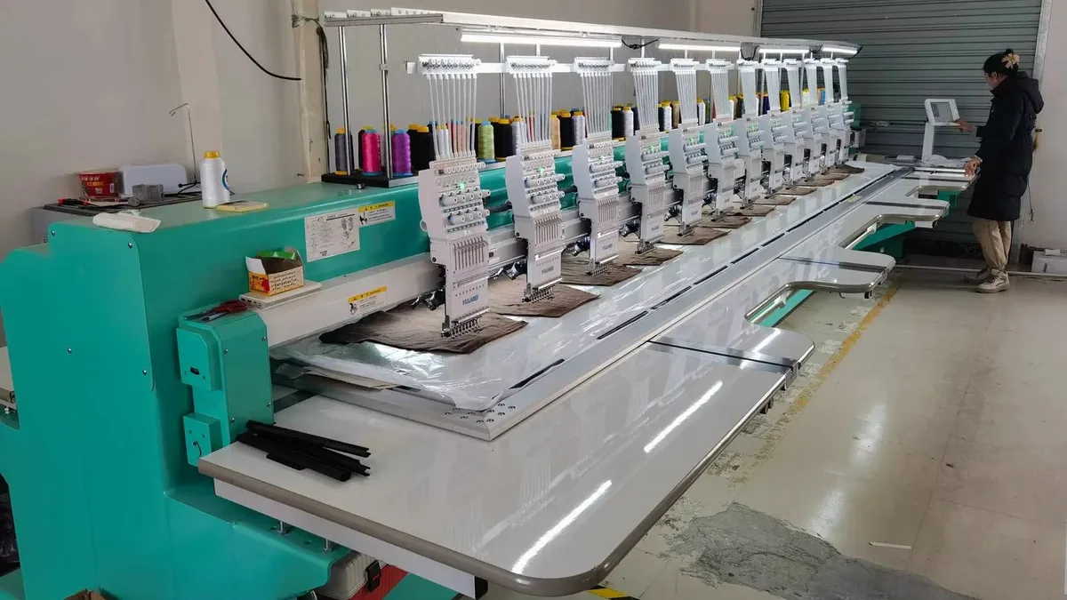 Multi-head embroidery machine prepared for garment decoration