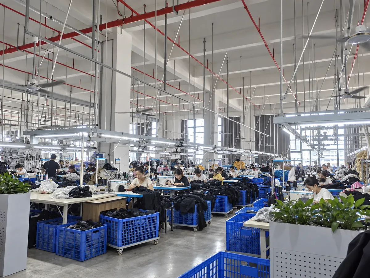 Garment sewing production floor with active workstations