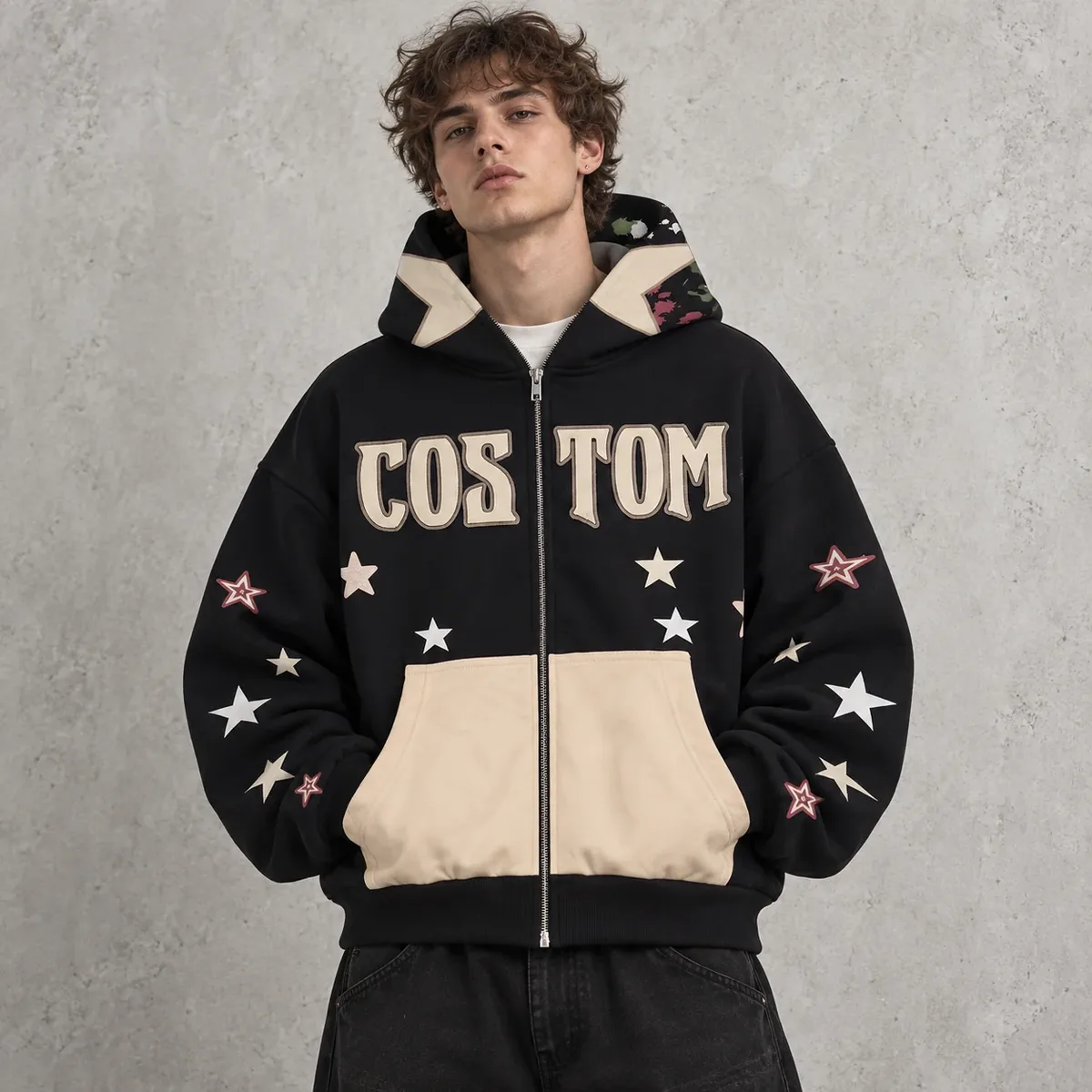 Model wearing star appliqué colorblock zip hoodie
