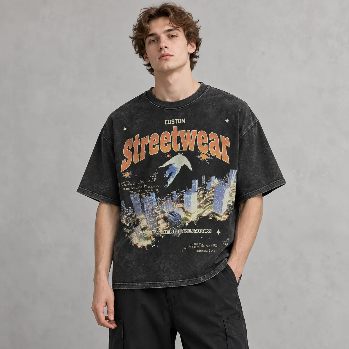 Model wearing acid-wash cropped graphic t-shirt