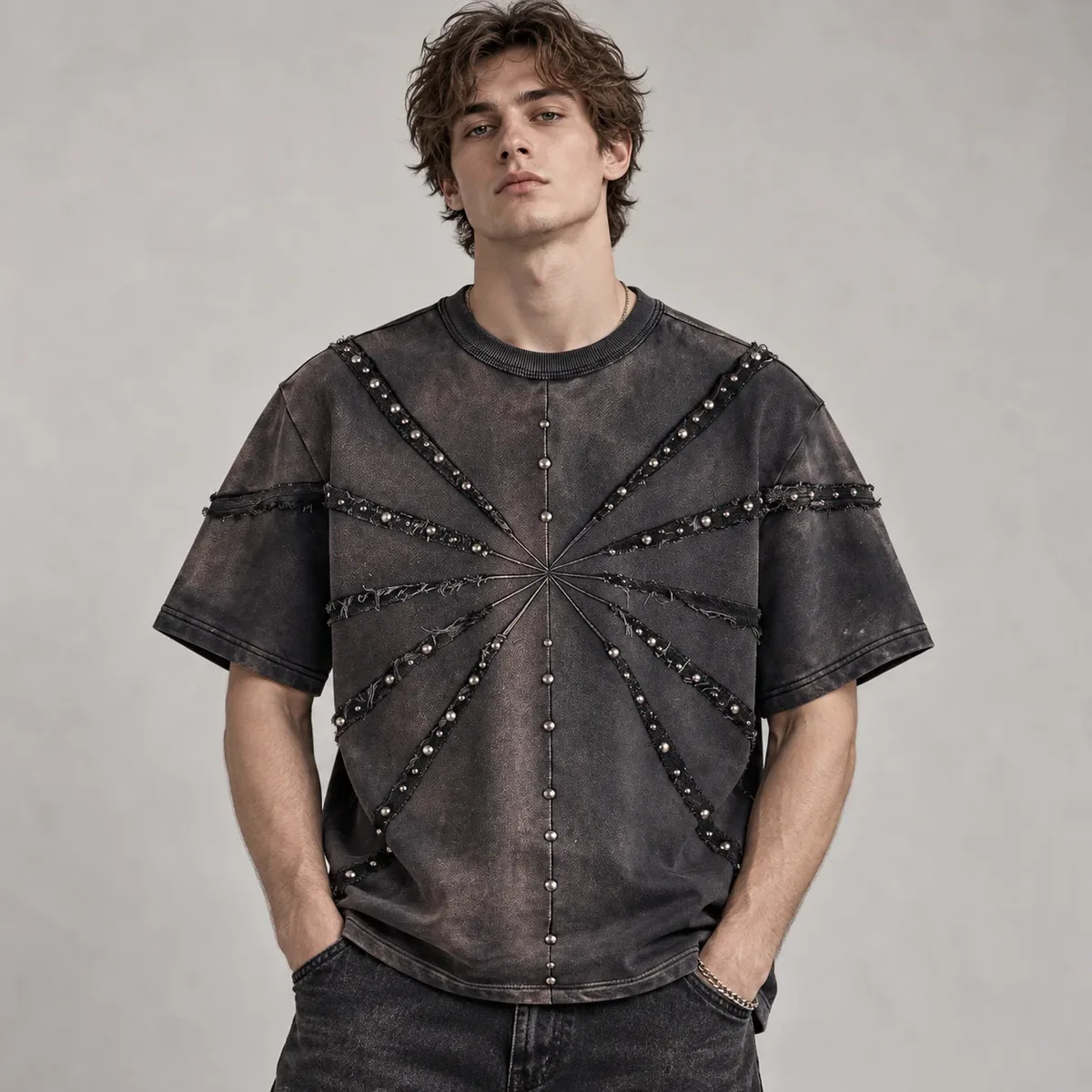 Model wearing cut-and-sew studded boxy t-shirt